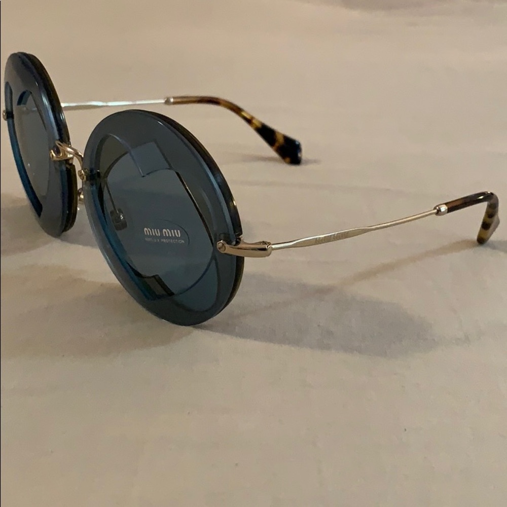 Miu Miu Round Blue Tinted Sunglasses with Gold Arms Ba